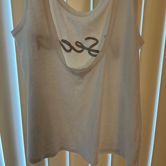 A white tank top from Victoria’s Secret. This is a size medium. - Picture 3 of 3